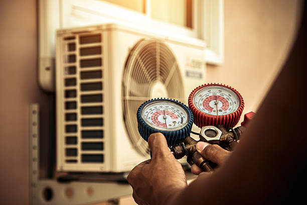 Professional Hvac technician working in West Medford, MA